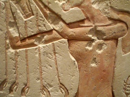 Detail from a relief depicting Akhenaten, with his names in cartouches chiseled out