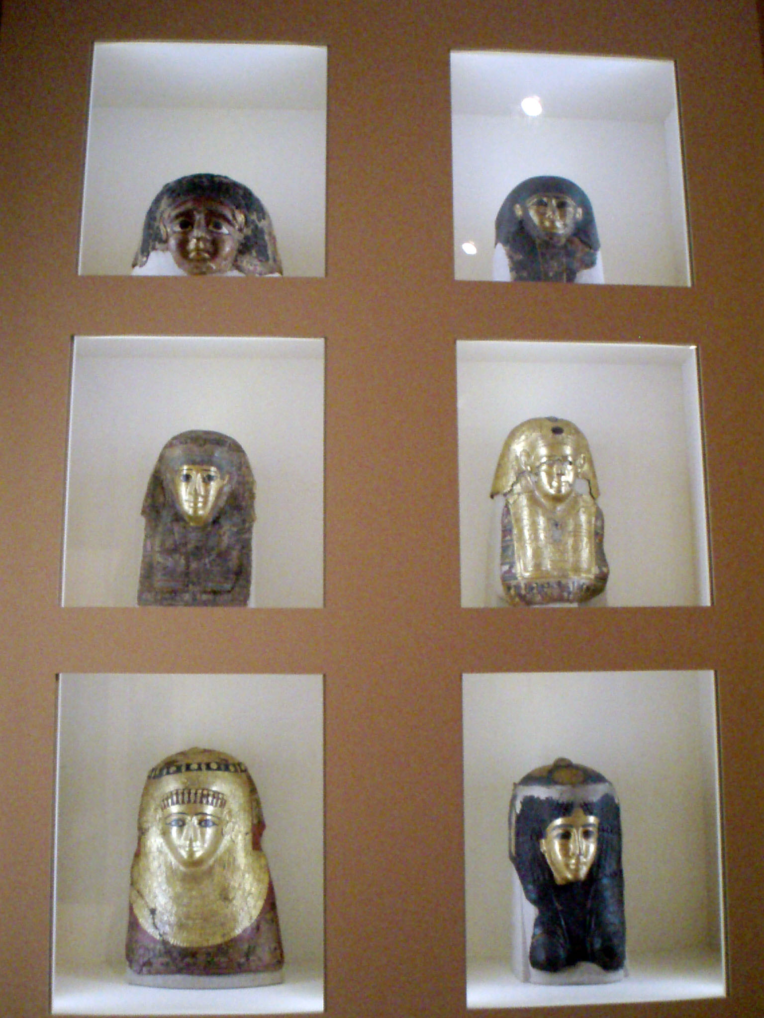Mummy Masks Flanking Doorway