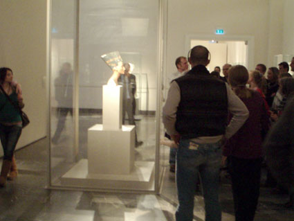 People Looking at Nefertiti Bust