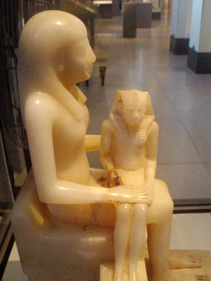 Alabaster statuette of Pepi II sitting on his mother's lap