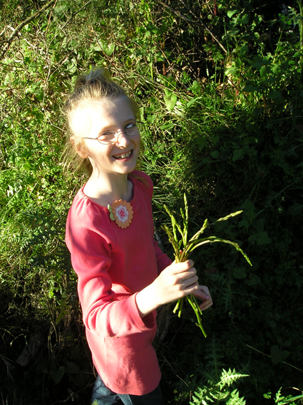 Vanessa Proudly Showing Off the Wild Asparagus She's Collected