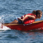 Ana at the Head of a Canoe During the Crab Race