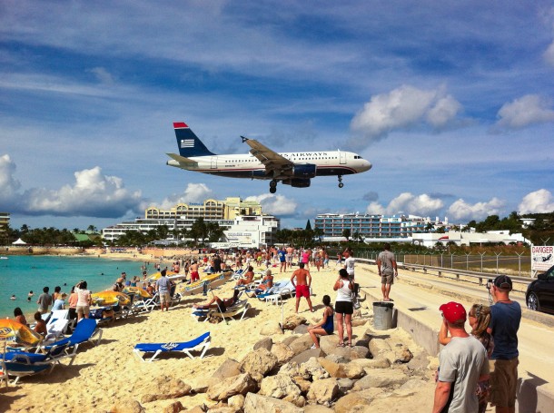 Plane Coming in for a Landing Over Beach in Sint Maarten Plane Coming in for a Landing Over Beach in Sint Maarten